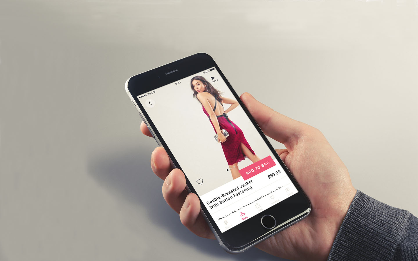 Person holding phone with Poq video feature on screen